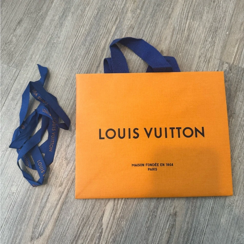 Chanel, Louis Vuitton, and Santa Maria Novella empty shopping bags - Picture 3 of 4